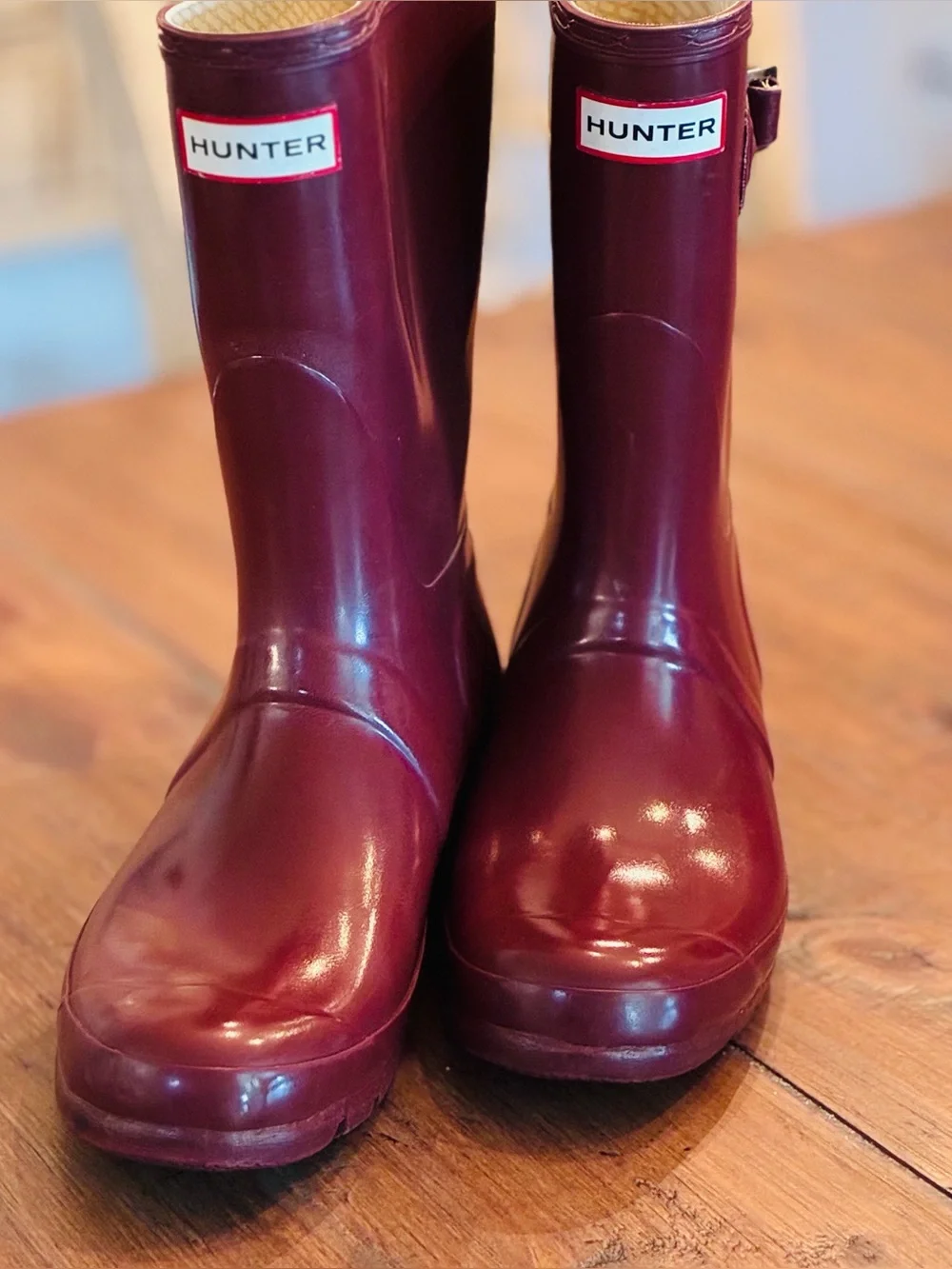 Hunter Red Gloss Rain Boots. Short with buckle. Unisex size men 8 women 9